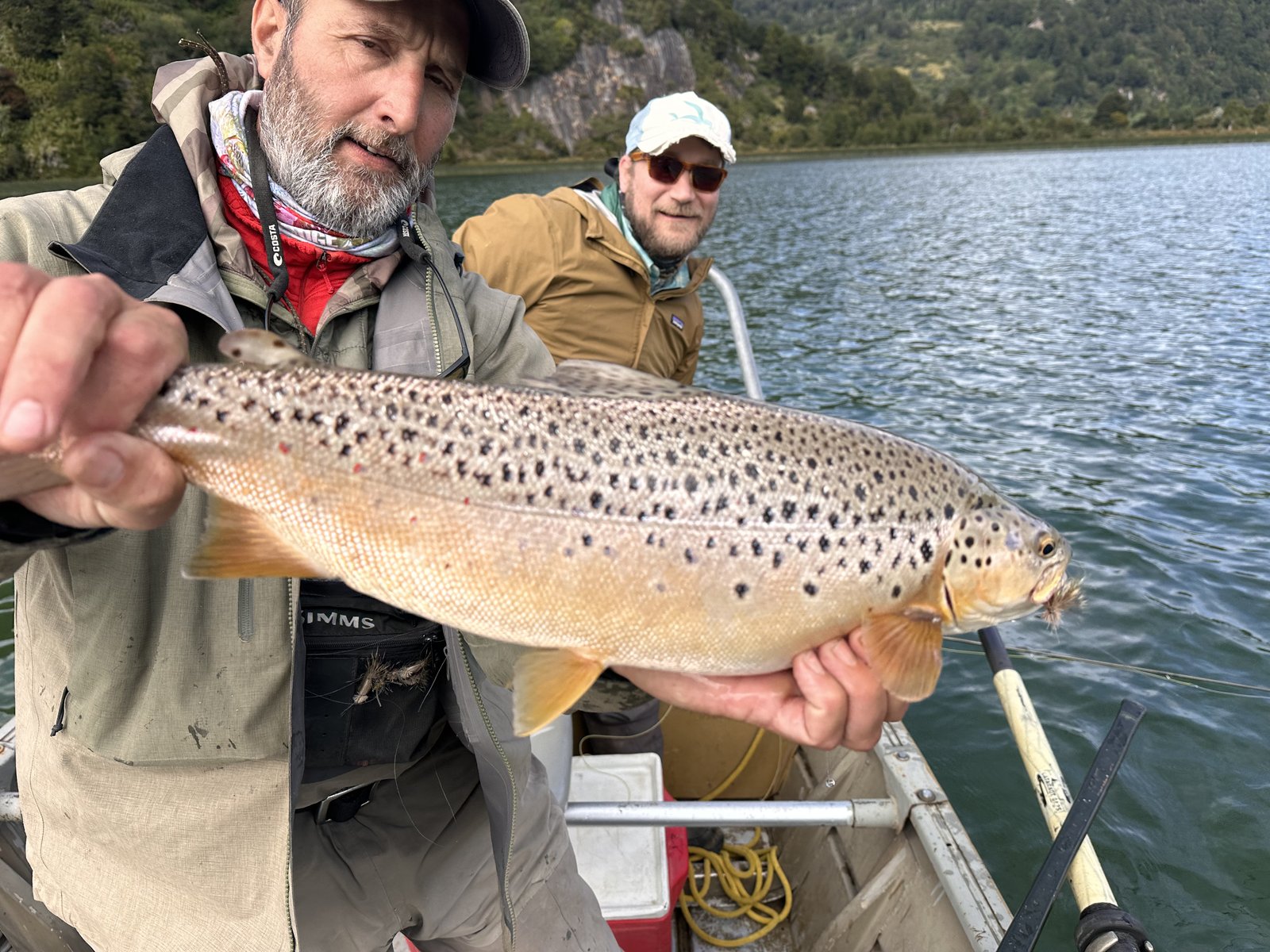 José Marti holding a thick brown trout in Chilean Patagonia