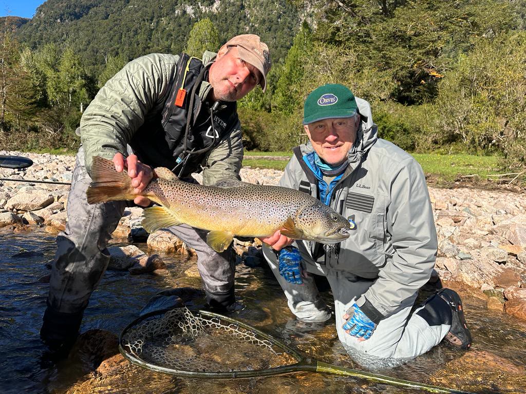 Guide José Marti and guest with a Río Blanco brown trout in Chilean Patagonia
